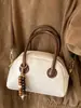 Bolsa Nova de Inverno 2025 Estilo Vintage Almofada para Mulheres, Bolsa Transversal Estilosa, Bolsa de Mão Tendência de Nicho, Bolsa de Boliche para Mulheres