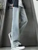 Jeans masculino vintage estilo americano com vibe de rua, calças retas soltas versáteis e com barra bootcut da nova coleção de primavera e outono para homens