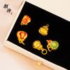 Colgante de campana de calabaza azul ardiente con alta retención de color de marea nacional, método antiguo, colgante de pulsera de campana de la paz de oro y arena, accesorios de joyería de marca de la suerte