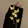 Pendientes Metálicos Largos de Encaje Mariposa con Borla de Diamantes Diseño Único Nicho Exquisitos de Moda Versátiles para Mujer