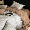 Juego de ropa de cama de cuatro piezas de algodón puro cepillado Clase A, ropa de cama de algodón de alta gama, funda de edredón gruesa, juego de tres piezas para estudiantes, sábana plana y sábana bajera