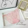 Bragas de encaje sexy estilo francés en color morado con un encanto puro y seductor, con intrincados encajes, de tiro bajo, tangas de malla transpirable para mujer