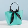 Bolso de mano con lazo y remaches, bolsa de papel, bolsa publicitaria para empresas mayoristas, bolsa de regalo, bolsa de compras, logotipo imprimible