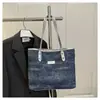 Moda de Verano 2025 Versátil Bolso de Hombro Portátil de Gran Capacidad Bolso para Mujer Diseño de Nicho de Moda Bolso Tote de Axila