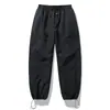 Pantalones casuales ligeros de secado rápido para exteriores estilo montaña para hombres y mujeres, ropa de trabajo impermeable primavera/verano, pantalones de pierna curva, pantalones deportivos de paracaidista