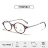 Gafas de Aleación de Titanio Marco Ovalado Simple Natural Remache Gafas Bloqueadoras de Luz Azul Almohadilla Nasal Tipo Copa de Vino para Mujer Lentes Planas Venta al por Mayor