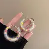 Pendientes de bola de pelo color curry retro otoño e invierno diseño de nicho pendientes de felpa de alta calidad joyería para orejas Joker venta al por mayor