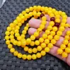 Pulsera de cuentas redondas de cera de abeja artificial de Jade Dragón Jade 8 mm cuenta redonda pulsera de 108 pulsera de múltiples anillos venta al por mayor de pulseras