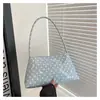 Bolso de lunares para mujer transfronterizo nuevo versátil PU compartimento único axila para ir al trabajo moda bolso de mano estilo pequeño aroma bolso de mujer