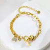 Pulsera de Doble Capa con Candado y Llave en Forma de Corazón Estilo 2026 para Mujer, Acero de Titanio Chapado en Oro con Diamantes, Joyería Versátil de Diseño Nicho
