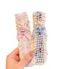 Diadema de velcro para niñas con borde de encaje y diseño de conejo de dibujos animados a cuadros, una herramienta mágica para recoger el cabello suelto, suave con el cabello y el flequillo del bebé