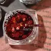 Joyería Roja de Año Nuevo Manicura Roja con Lentejuelas Adornada con Polvo Fino de Brillo de Arena Movediza Manicura de Uñas