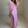 Verão 2026 Novo Estilo Transfronteiriço Europeu e Americano Comércio Exterior Roupas Femininas Moderno e Elegante Conjunto de Saia Longa Listrada com Lapela e Fenda