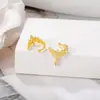 Versión coreana de aretes accesorios de joyería semiacabados fabricantes de materiales aretes de hoja metálica al por mayor aretes personalidad Joker