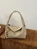 Bolso de mano de gamuza de color liso, nuevo estilo coreano para el día a día, bolso de hombro casual de gamuza de alta gama para mujer, otoño e invierno