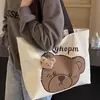 Bolsa de Lona para Estudiantes de un Solo Hombro de Gran Capacidad Estilo Caricatura Japonesa Versátil Bolso de Mano para Clase