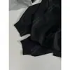 Yuran 26 Estilo Nuevo de Principios de Primavera Moda Lino Algodón Liso Silueta Micro-Capullo Jacquard Denso Top de Punto Casual