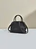 Bolso Nuevo Modelo 2026 con Forma de Concha Negra Hecho de Piel de Vaca de Primera Capa, Bolso de Mano y Bolso Cruzado, Bolso de Hombro Simple y Versátil para el Viaje Diario