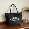Bolso de Mano de Moda y Estilo 2026 Primavera Nuevo Bolso Tote de Gran Capacidad Personalizado Casual Simple para Mujer