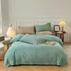 2025 Estilo Botón Estilo Sin Estampar Sábana para Cama Amigable con la Piel Sábanas y Sábanas Ajustadas Juego de Cuatro Piezas Algodón Lavado Japonés Juego de Tres Piezas Lujo Accesible Ins
