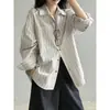 Camisa retro de estilo japonés a rayas azul marino de manga larga para mujer, primavera y otoño, con un diseño elegante, holgada y casual, camisa versátil para ir al trabajo