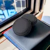 En stock bolsa redonda de eva negra para auriculares bolsa de almacenamiento para accesorios digitales auriculares Bluetooth impermeable caja de embalaje portátil