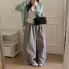 Foto real das novidades para o Outono de 2026: roupas femininas coreanas de alta qualidade de Dongdaemun, calças confortáveis e casuais com um estilo coreano descontraído