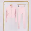 Conjunto Lulu Df de Jaqueta Curta com Gola Alta e Calça Cropped com Etiqueta, Em Estoque Envio Direto, Gola Alta Slim Fit, Zíper Dourado Elástico