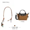 Solo se vende la bolsa interior - la bolsa exterior no está incluidaBolsa mini tipo dumpling Longchamp, Papel Dupont Longchamp