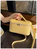 Bolsa feminina transfronteiriça, bolsa lancheira com padrão de lichia estilo europeu e americano, nova bolsa de mão versátil 2026, bolsa de ombro e transversal simples e moderna