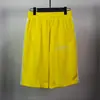 Traje de Shorts Casuais Básicos de Verão 2025 Casal Homem e Mulher Calças de Anjo Calças de Praia Calças de Estudante com Alfabeto