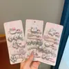 Pinza para el pelo de perla rosa plateada para niños, linda pinza lateral de flor pequeña, pinza para flequillo dopamina, estilo dulce y genial