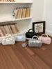 Bolsa de bolos para mujer, nuevo estilo coreano de moda primavera 2026, bolso de mano de alta gama versátil para el hombro y cruzado para el trabajo