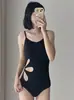 Traje de baño calado floral para mujer 2026 Nuevo traje de baño de una pieza tipo triángulo para entrenamiento en piscina y competición en color liso