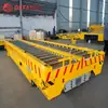 A Linha de Produção da Oficina Utiliza um Transportador de Rolos de Estação Dupla com Carrinho Elétrico em Trilho com Controle Remoto por Manípulo Recarregável Veículo de Transporte em Trilho