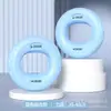 Ejercitador de Agarre de Mano de Silicona Equipo para Entrenar la Fuerza de la Mano Hombres y Mujeres Bola de Fuerza de Agarre Fuerza de Muñeca Entrenamiento Muscular Fuerza de Cinco Dedos Anillo de Agarre de Rehabilitación