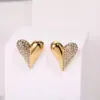 Brincos de Tarraxa Europeus e Americanos de Moda Transfronteiriços em Forma de Coração com Diamantes Aço Inoxidável Banhado a Ouro 18K Brincos Elegantes Versáteis Atacado