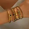 Mayoristas Transfronterizos Europeos y Americanos Fabricantes de Broches Joyería Fina para Mujer, Pulsera de Acero de Titanio Color Dorado que No se Desvanece