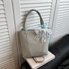 Bolsa Balde Simples com Textura Casual Moda 2025 Primavera Novo Estilo Trendy Bolsa de Ombro Transversal Nicho Feminino