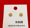 Tienda de Oro Mismo Estilo Pendientes de Pluma Xiangguan Pendientes de Brújula Hueca para Mujer Pendientes Dorados de Círculo Completo con Diamantes Brillantes