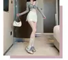 Falda de Traje Negra para Mujer, Nuevo Estilo Otoño e Invierno 2025, Cintura Alta, Ceñida a la Cadera, Corte A con Pantalones Cortos de Seguridad, Elegante Falda Corta
