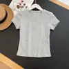 Venta al por mayor transfronteriza Ropa de mujer europea y americana Verano Nueva moda Simple Casual Cuello redondo Manga corta Corte ajustado Top 4744101