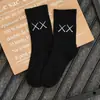 Meias de cano médio da marca da moda para homens e mulheres garfo garfo olho xx preto branco estilo faculdade meias esportivas PF086