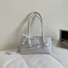 Viaje Retro Primavera Verano 2026 Hebilla Nuevas Llegadas Estética Moderna Gran Capacidad Bolso de Hombro Único Portátil para el Brazo