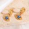 Pendientes sencillos elegantes de acero de titanio de moda europea y americana, pendientes ligeros de lujo de alta sensación, pendientes de acero inoxidable con forma de ojo de diablo.