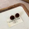 Pendientes de Bola Pequeña con Terciopelo Rojo para Mujer 2025 Nuevo Estilo Caliente Pendientes Elegantes de Gama Alta Pendientes Personalizados Versátiles Exquisitos