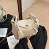 Bolso cruzado de cuero de un solo hombro estilo francés U2025, nuevo y moderno, diseño de nicho, con un toque de alta gama, popular bolso de mano tipo almohada