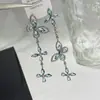 Pendientes de plata súper elegantes con cierre de presión, con diseño de mariposa calada incrustada de diamantes y flecos, a la moda y dulces, pendientes de lujo ligero y de alta gama