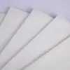 Tela 60G blanco poliéster tejido liso panel compuesto laminado PET forro de prenda tela no tejida spunlace
