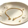 El brazalete de serpiente de hueso con diamantes redondos más vendido de Amazon, lujo ligero y sensación de alta gama, joyería simple y única, elegante y versátil